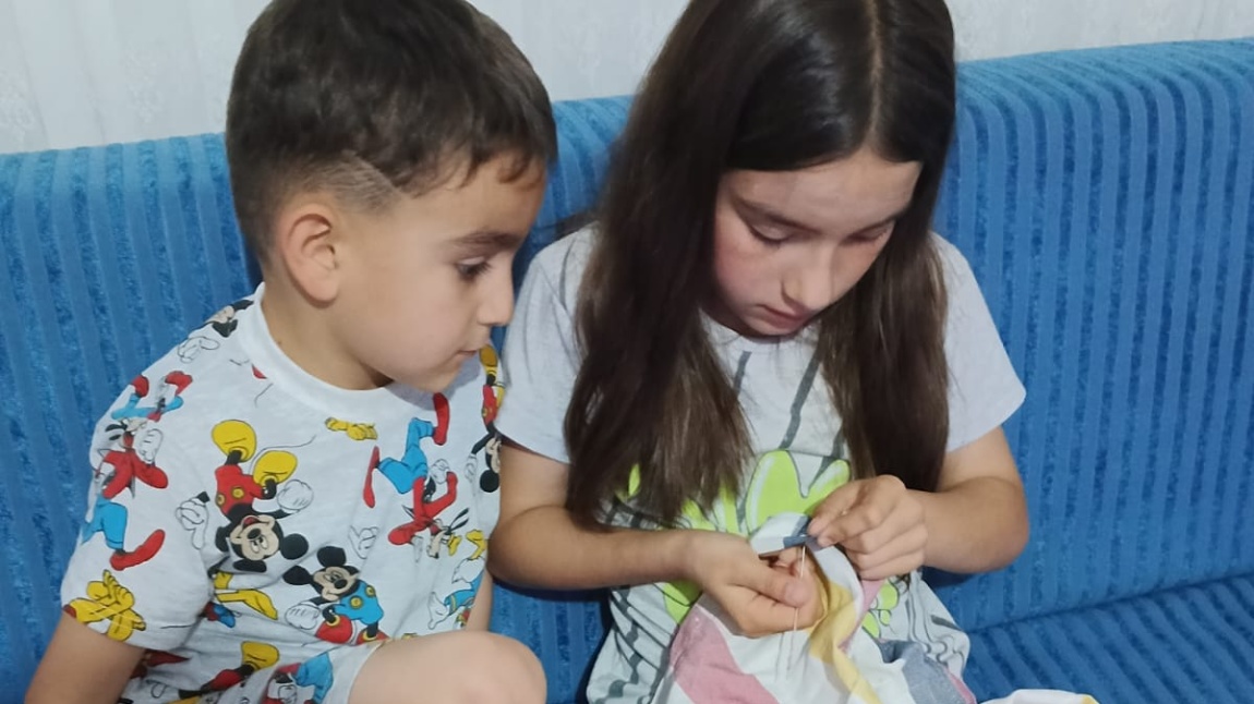 DÜĞME DİKİM VE TAMİRİ